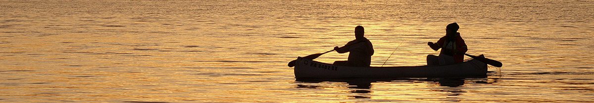 2 people canoeing, sillouette