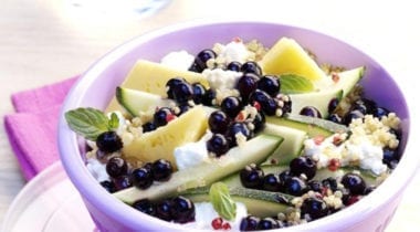 bowl of fresh fruit and vegetables with grains