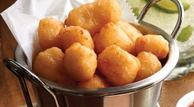 fried cheese curds in a dish