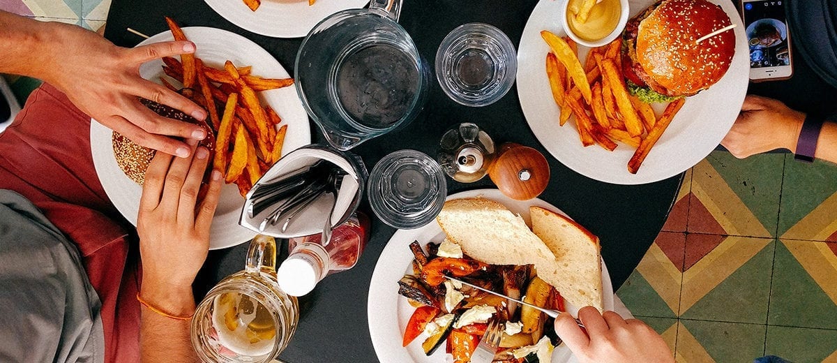 table top with plates of food