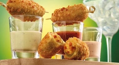bacon cheddar jalapeno poppers with sauces in shot glasses