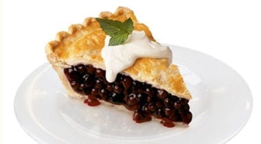 slice of blueberry pie with ice cream