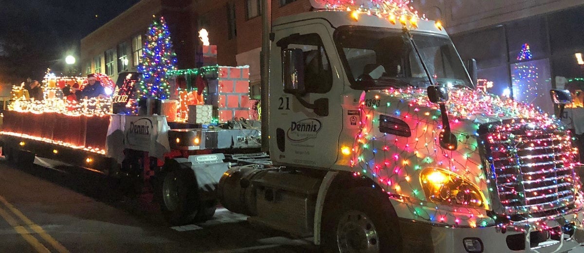 delivery truck lit up with Christmas lights
