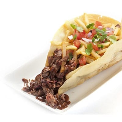 bbq brisket taco topped with salsa and fries