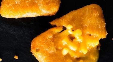 mac and cheese wedge appetizers, opened showing filling