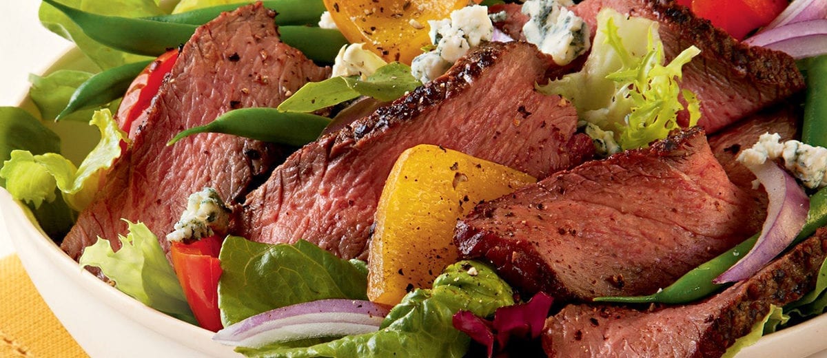 salad with sliced beef and bleu cheese