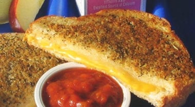 herb grilled cheese sandwich on school tray