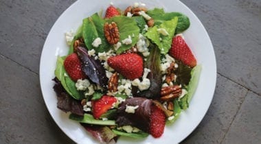 strawberry balsamic salad with cheese crumbles