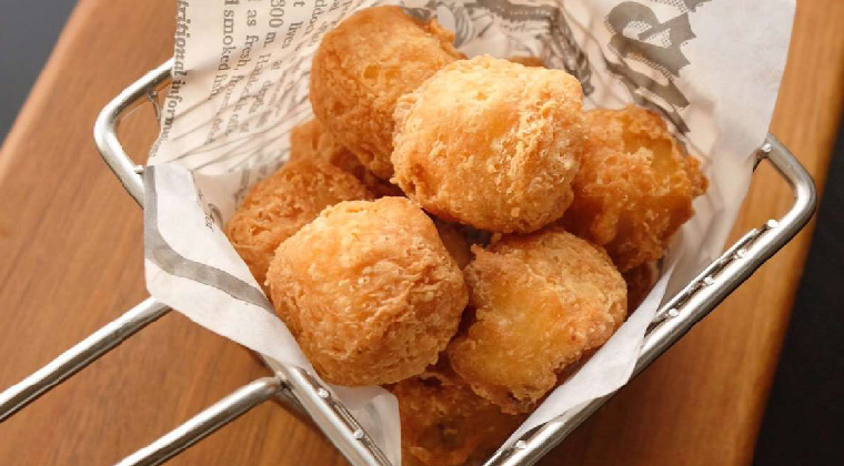 fried haddock balls in container