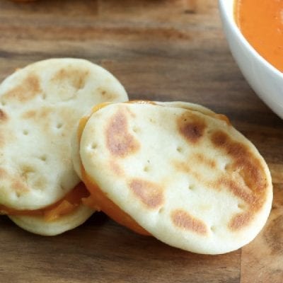 mini naan bread and bowls of sauce