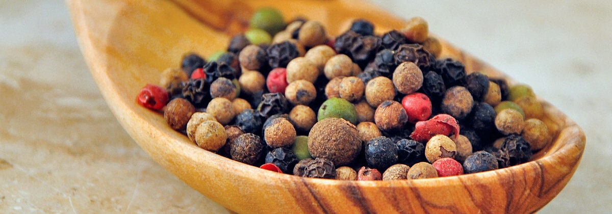 Peppercorns on Wood Spoon