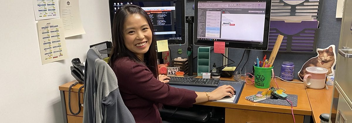 Amy Yuen working at desk