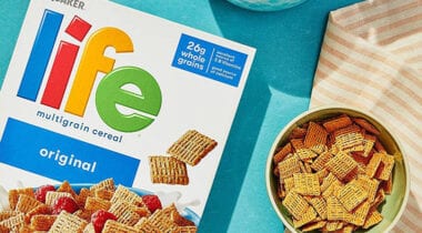 life cereal next to box in a bowl