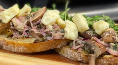 mushrooms, onions, and cheese curds on bread