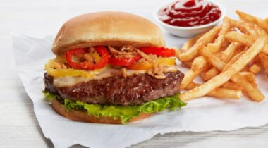 loaded cheeseburger with fries and ketchup portion cup