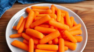 plate full of baby carrots