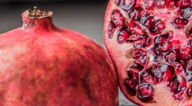 cut pomegranate showing inside with seeds