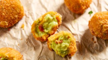 5 guac bites on paper napkin, two bites broken open to see contents