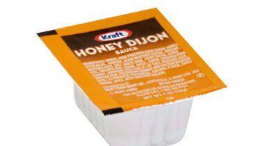individual container of honey dijon sauce