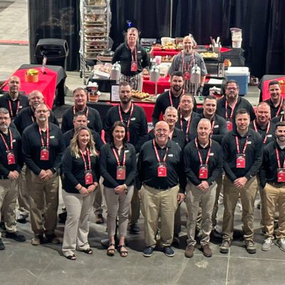 group photo on a trade show floor