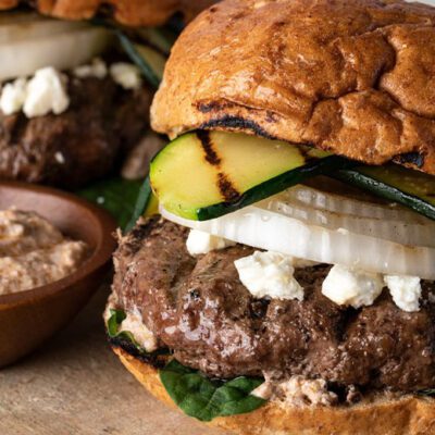 burger with grilled vegetables and onion