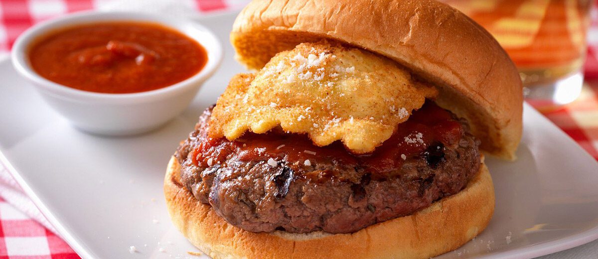 burger topped with fried ravioli