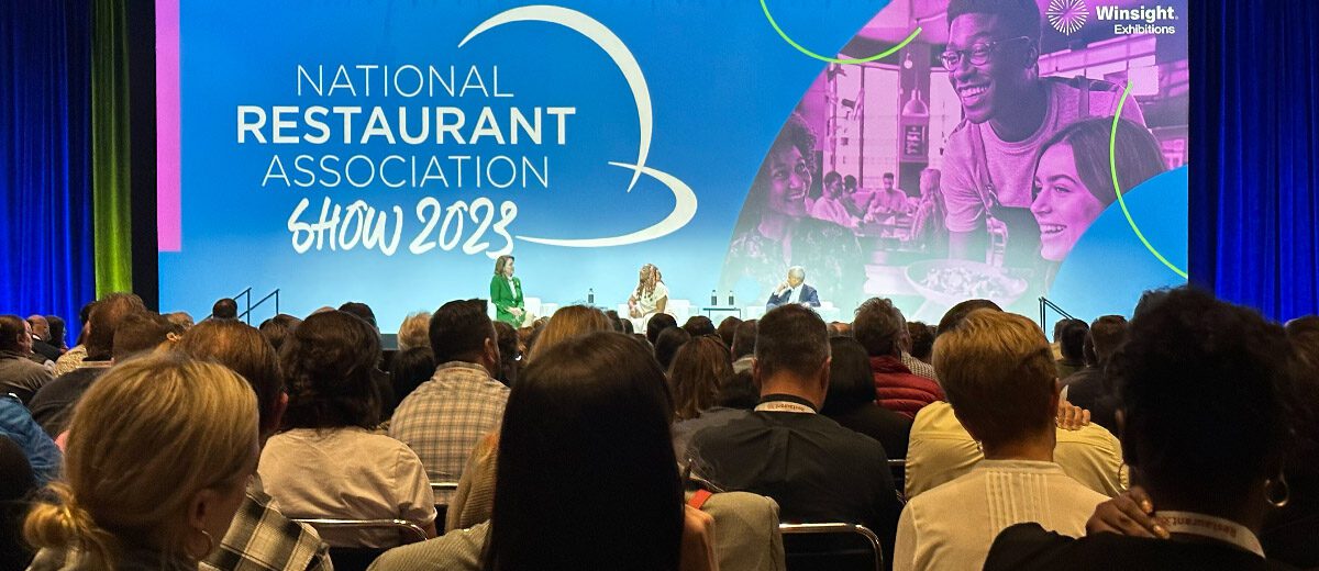 speaker on stage at 2023 restaurant show