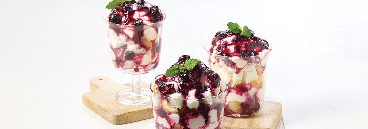 three different glass cups with blueberry desserts