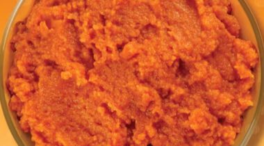 close up of uncooked pumpkin pie filling