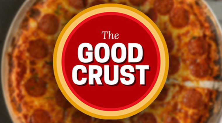 The Good Crust logo over out of focus pizza
