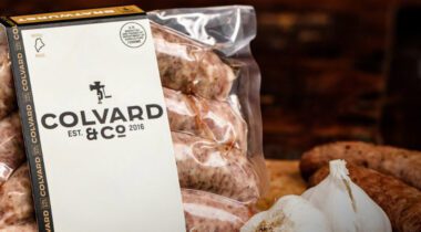colvard sausage package with sausage and garlic lifestyle graphic