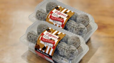 two closed packages of LaBree's Plain & Chocolate Donut Holes