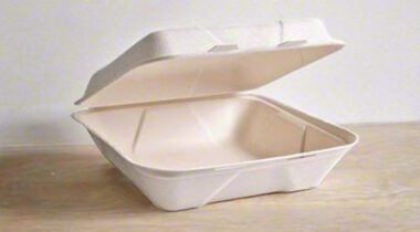 empty white take out container on tabletop