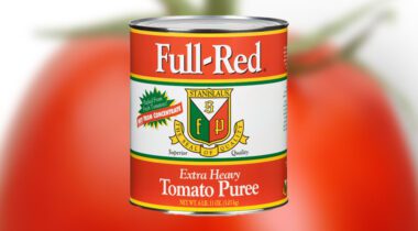 full red tomato puree can