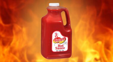 handled plastic jug of hot sauce
