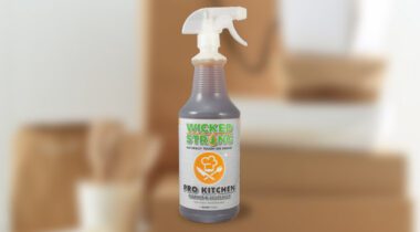 a spray bottle of brownish liquid cleaner