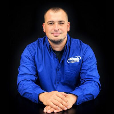 man in blue shirt with black background