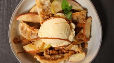 apple crisp prepared with potstickers, scoop of vanilla ice cream