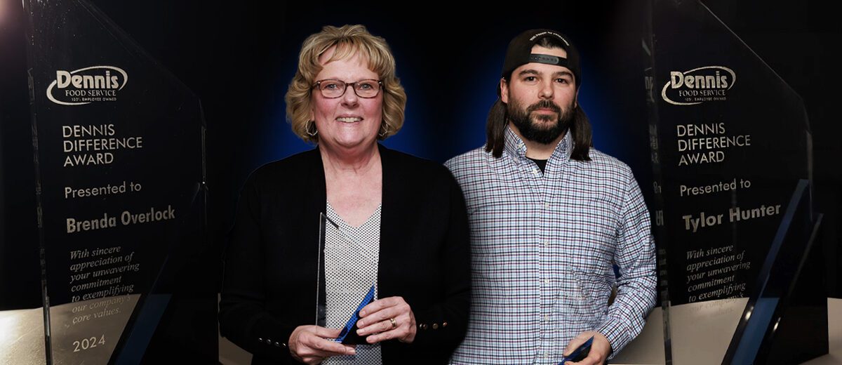 female and male over graphic image of glass award.