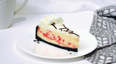 slice of peppermint cheesecake on white plate