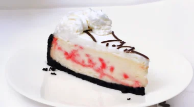 slice of peppermint cheesecake on white plate