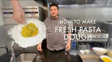 fresh pasta dough banner graphic, chef in grey uniform