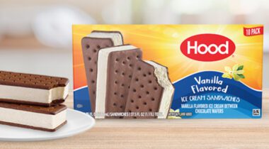 two opened ice cream sandwiches on white plate next to box of Hood Vanilla Flavored ice cream sandwiches