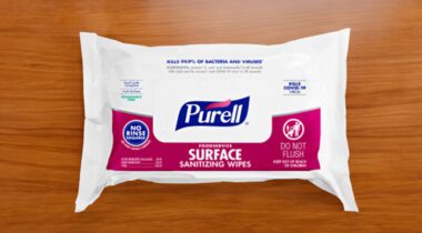 package of Purell Surface Sanitizing Wipes on wooden tabletop