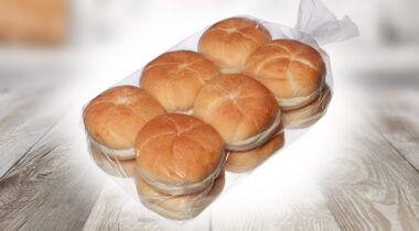 a clear plastic package of round rolls