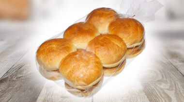 a clear plastic package of round rolls