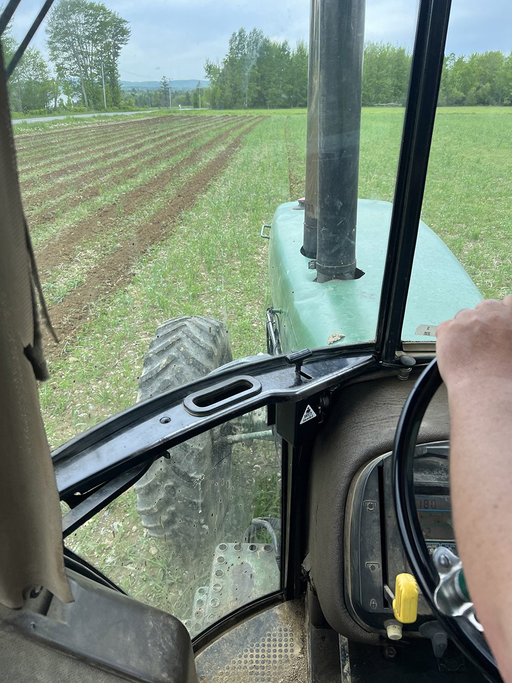 view from inside a farm tractor
