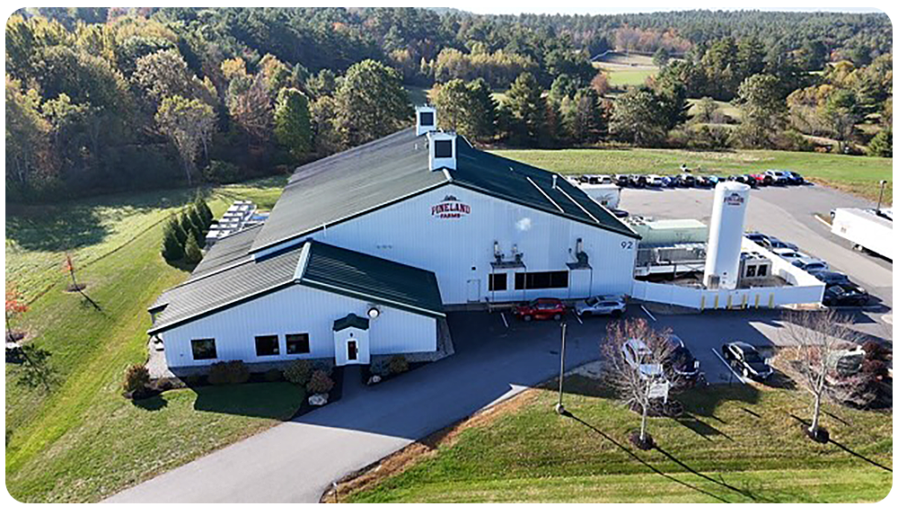 aerial view of a white farm building