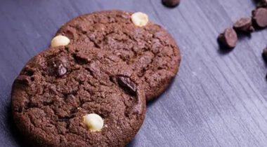 two chocolate cookies with chocolate and white chocolate chips