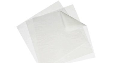 Three square white pizza box liners